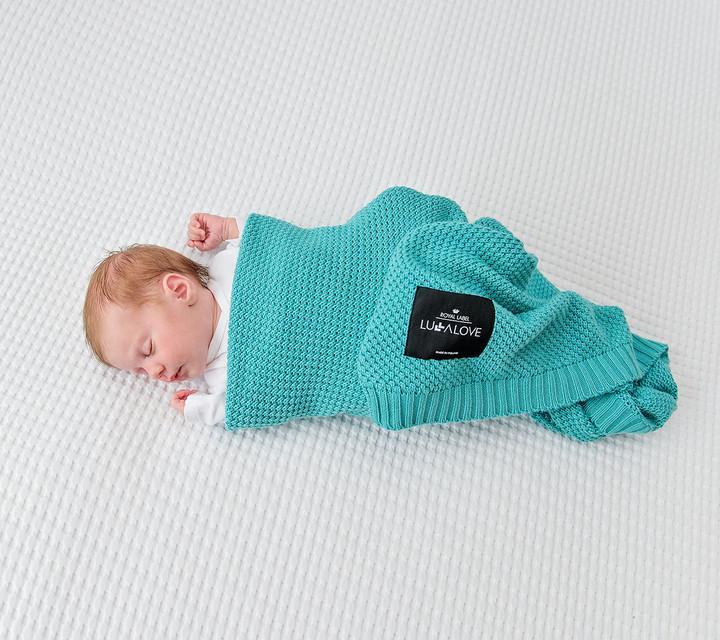 Baby swaddled in a bamboo blanket