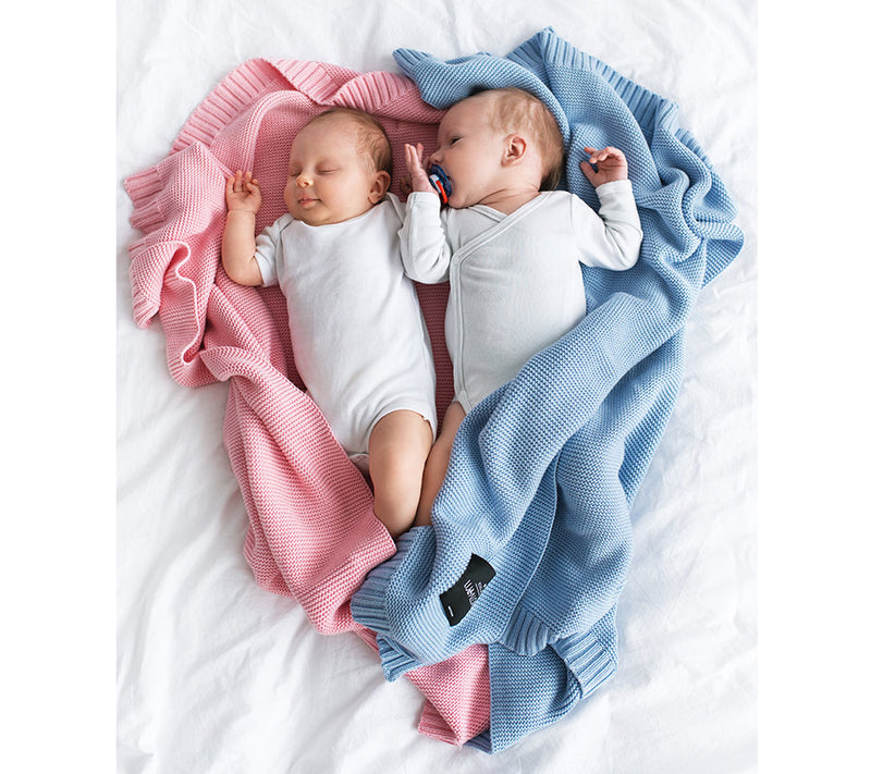 Two babies in Lullalove bamboo baby blankets