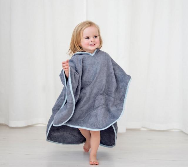 Girl in a poncho towel