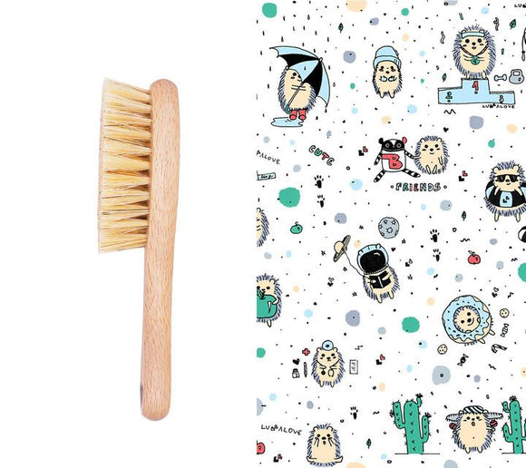 Natural baby hairbrush with a muslin cloth